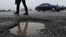 Domino’s Pizza fixing potholes is an ominous sign