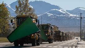 A parade of snowplows signals the start of winter at JBER