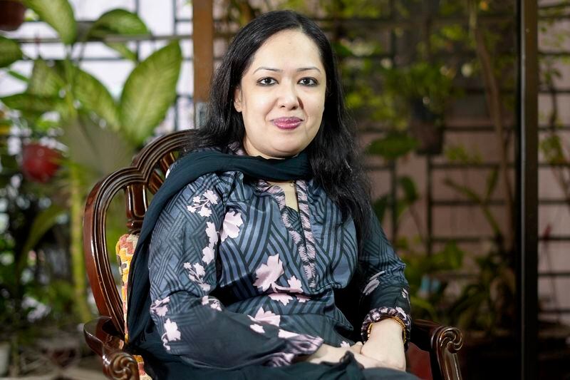 Rumeen Farhana, a politician from the main opposition Bangladesh Nationalist Party, sits for a photograph during an interview at her residence in Dhaka, Bangladesh, Feb. 15, 2024. Farhana, a vocal critic of the ruling party, was falsely depicted wearing a bikini in a video created using artificial intelligence. The viral video sparked outrage in the conservative, majority-Muslim nation. (AP Photo/Al-emrun Garjon)