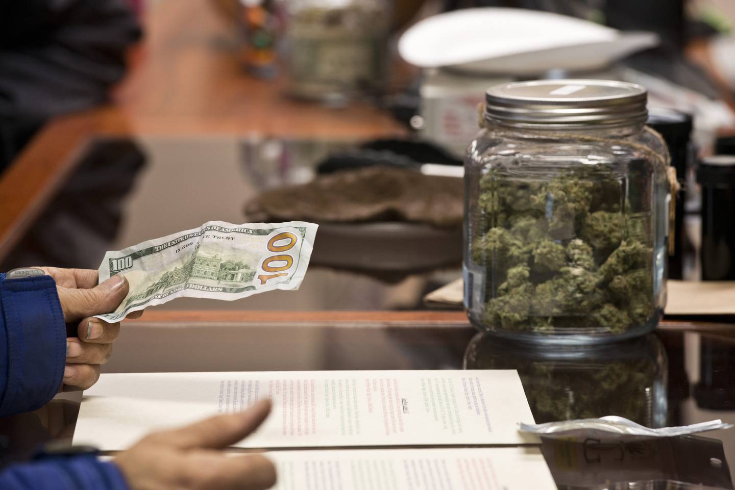 Herbal Outfitters marijuana, pot, transaction, cash, money