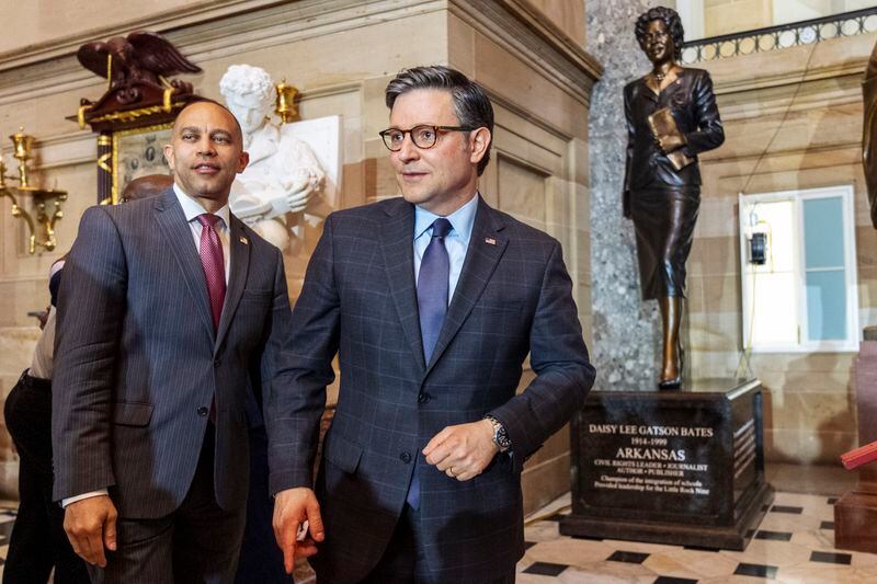 House Minority Leader Hakeem Jeffries, left, and House Speaker Mike Johnson, of Louisiana, attend a statue unveiling ceremony of Daisy Bates, of Arkansas, Wednesday, May 8, 2024, at Statuary Hall on Capitol Hill in Washington. (AP Photo/Jacquelyn Martin)