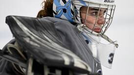 Double dominance: Dimond High’s Zoie Campbell is a standout goalie for boys and girls hockey teams