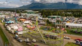 In Palmer, a busy scene as workers prepare for the return of the Alaska State Fair