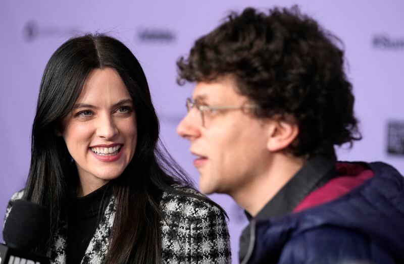 Riley Keough and Jesse Eisenberg, cast members in "Sasquatch Sunset," are interviewed at the 2024 Sundance Film Festival, Friday, Jan. 19, 2024, in Park City, Utah. (AP Photo/Chris Pizzello)