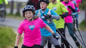 Photos: Rollerskiers take to Anchorage’s Moose Loop to raise awareness for the sport