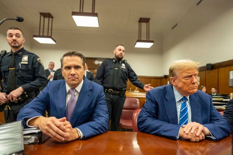 Former President Donald Trump awaits the start of proceedings on the second day of jury selection at Manhattan criminal court, Tuesday, April 16, 2024, in New York. Donald Trump returned to the courtroom Tuesday as a judge works to find a panel of jurors who will decide whether the former president is guilty of criminal charges alleging he falsified business records to cover up a sex scandal during the 2016 campaign. (Mark Peterson/Pool Photo via AP)