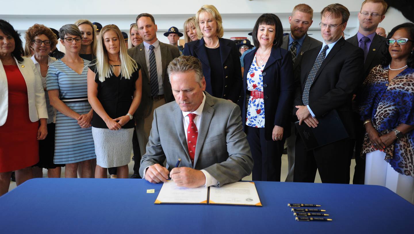 Gov. Mike Dunleavy signs House Bill 49 