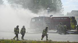 Anchorage firefighters bring blaze at Fairview auto body shop under control