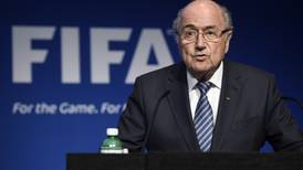 With scandal swirling, FIFA head Sepp Blatter to step down