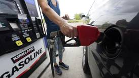 US gas prices plunge toward $3 a gallon as demand drops worldwide