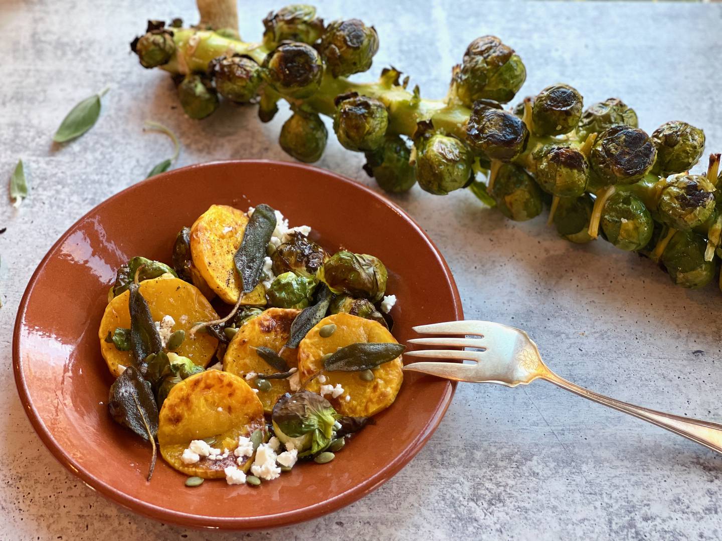 Roasted squash and Brussels sprouts with brown-butter fried sage