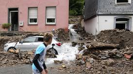 More than 60 dead, dozens missing in Germany and Belgium as flooding turns streets into torrents