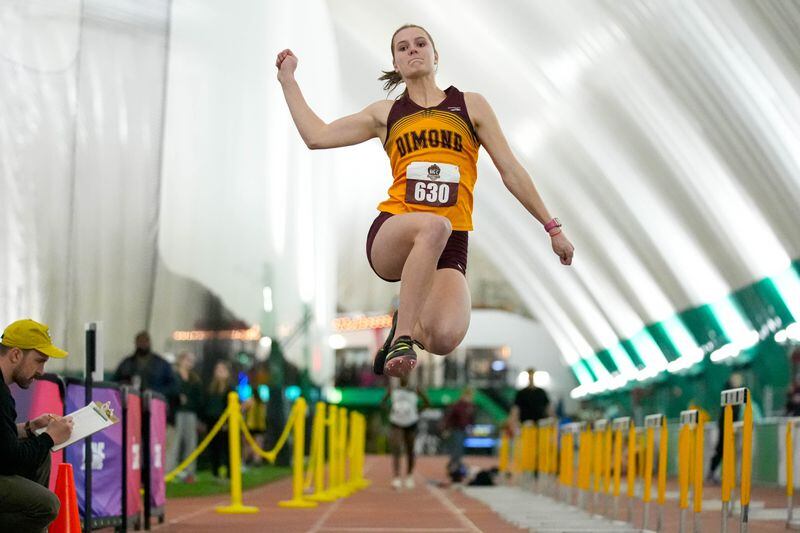 Dimond's Sarah Dittman competes in the long jump on Friday, April 5, 2024 during the Big C Relays at the Dome in Anchorage. (Loren Holmes / ADN)