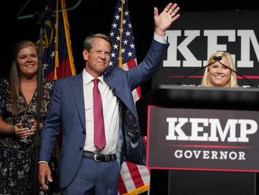 Kemp defeats Perdue in blow to Trump and his false election claims