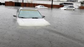 South Carolina flood: Door-to-door searches, swamped roads
