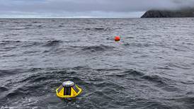 Subsistence hunters measure wave height and use an app to predict conditions at sea
