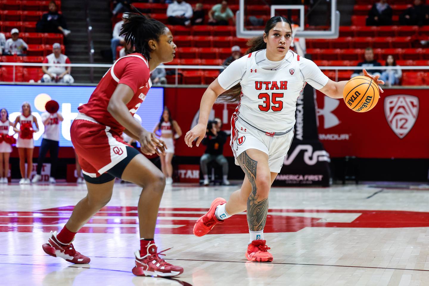 Utah's Alissa Pili of Anchorage dribbles in a game against the University of Oklahoma