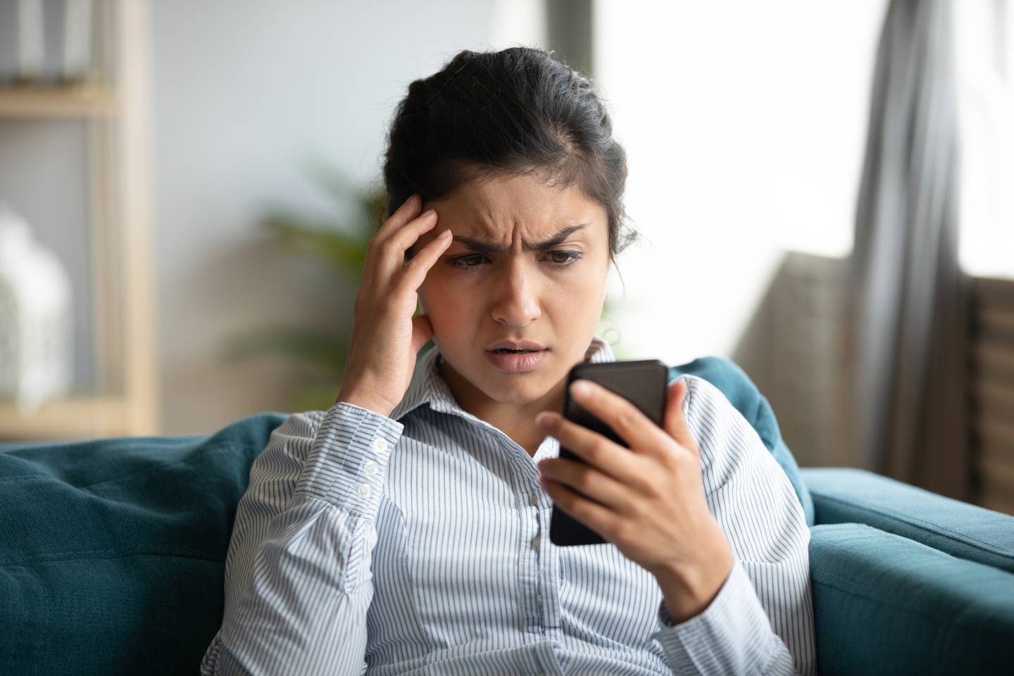 Frustrated girl feel stressed with cellphone problems