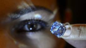 Rare blue diamond sells for record $48.5 million at auction