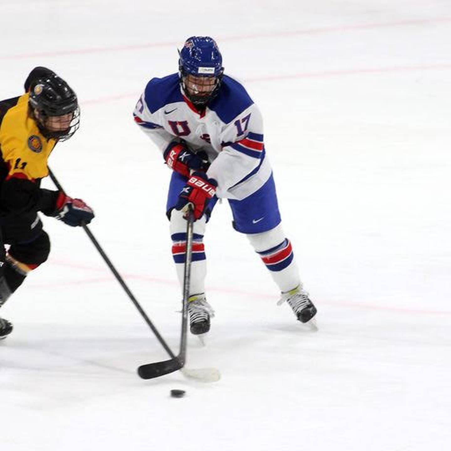 Mac Swanson of Anchorage of Team USA skates with the puck during a match at the Under 17 Five Nations Tournament