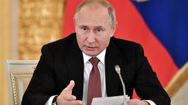 Putin blames Ukraine for standoff, boosts defenses in Crimea