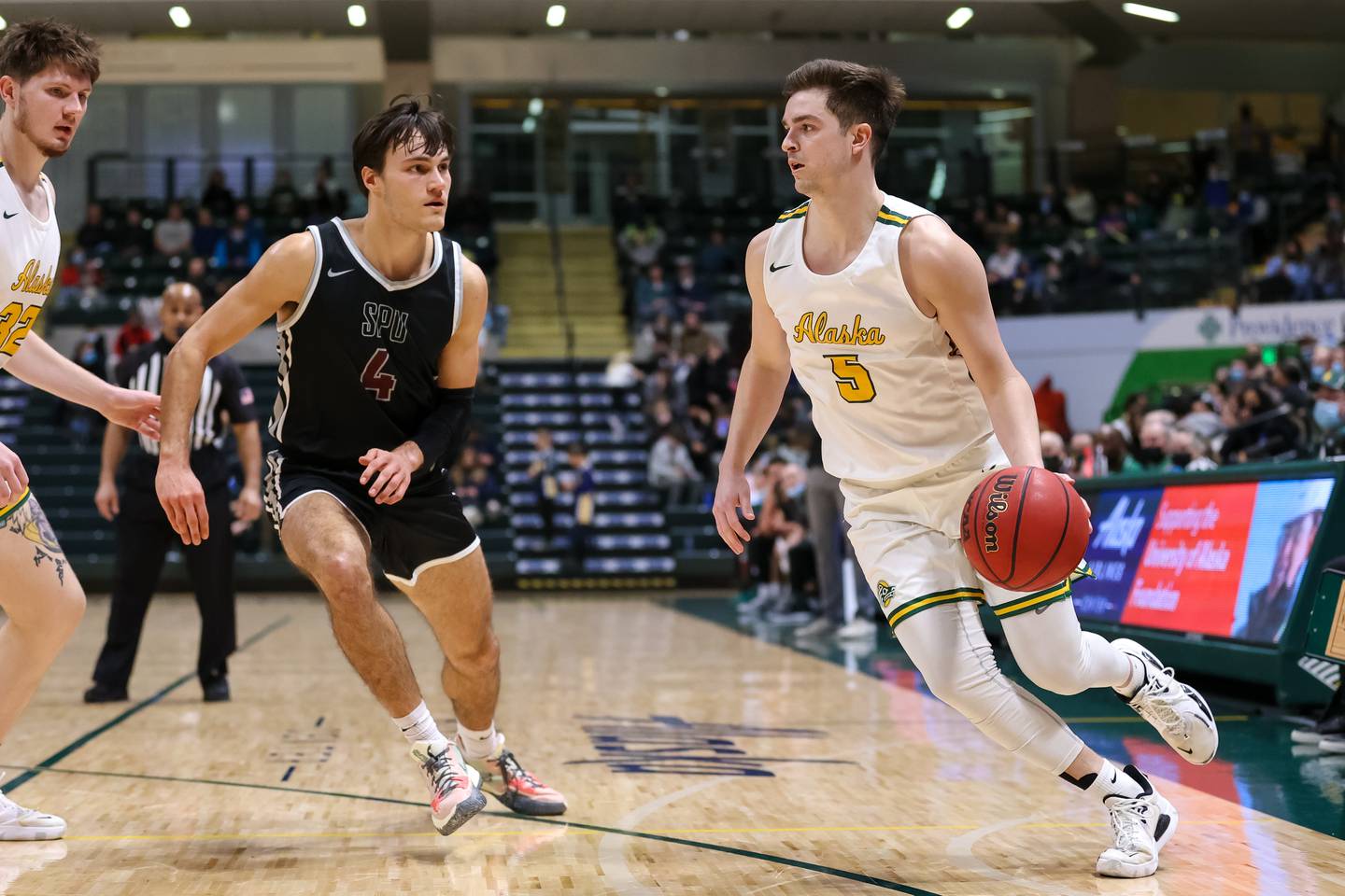 UAA's AJ Garrity drives to the basket against Seattle Pacific