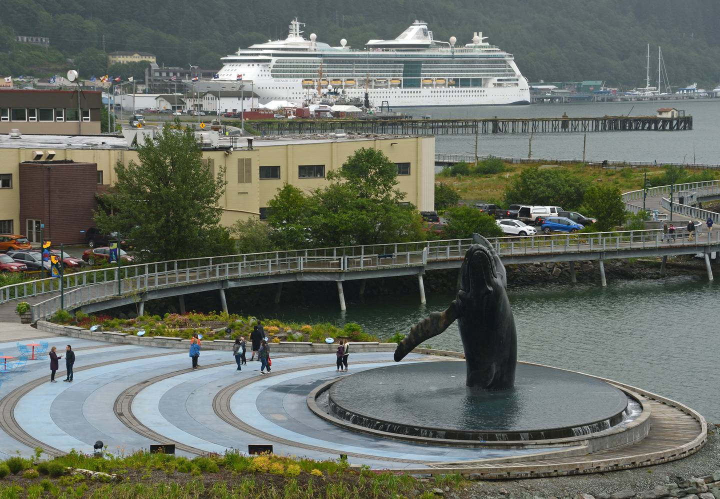Cruise ship and whale statue