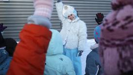The Winter Queen, Snow Maiden and Father Frost make an appearance at an Anchorage elementary school