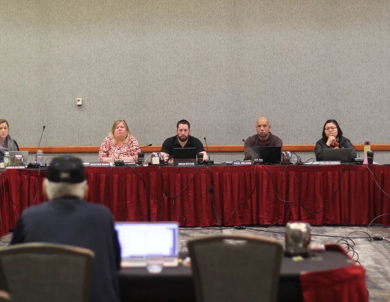 Members of the North Pacific Fishery Management Council’s advisory panel listen to testimony from a tribal leader in Anchorage this week. (Nathaniel Herz/Northern Journal)