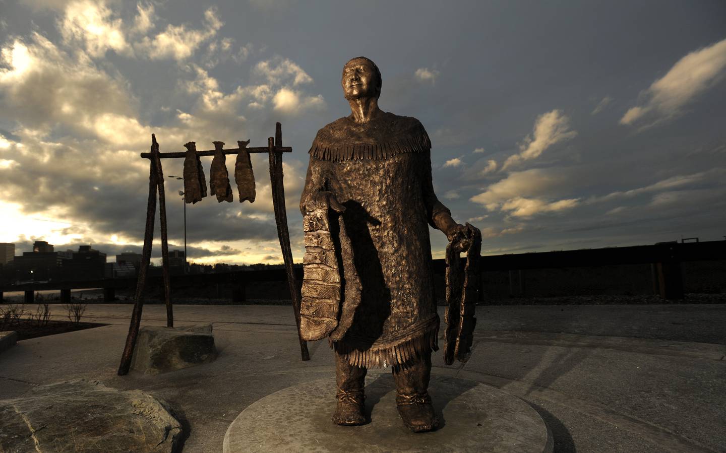 Bronze sculpture at the Ship Creek small boat launch Village of Eklutna Dena'ina culture interpretive display 