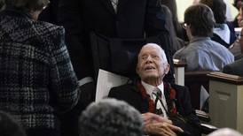Rosalynn Carter eulogized before family and friends as husband Jimmy bears silent witness